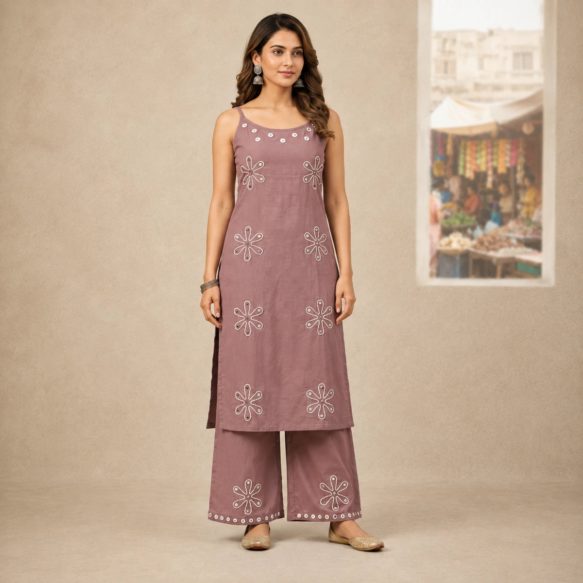 Women's mauve sleeveless embroidered kurta set with matching wide-leg pants