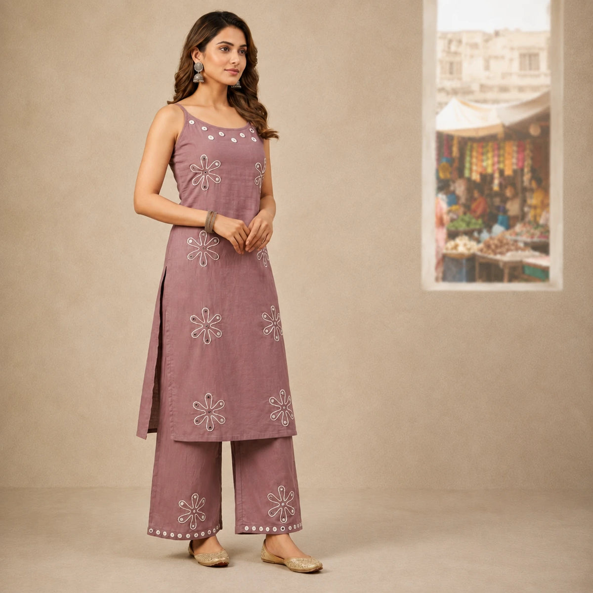 Women's mauve sleeveless embroidered kurta set with matching wide-leg pants