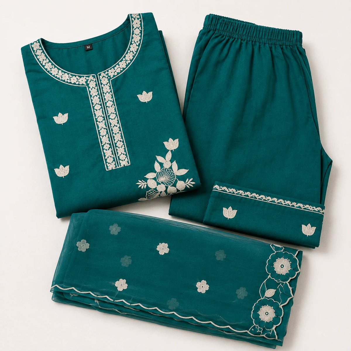 Women's teal embroidered straight kurta set with matching pants and floral dupatta