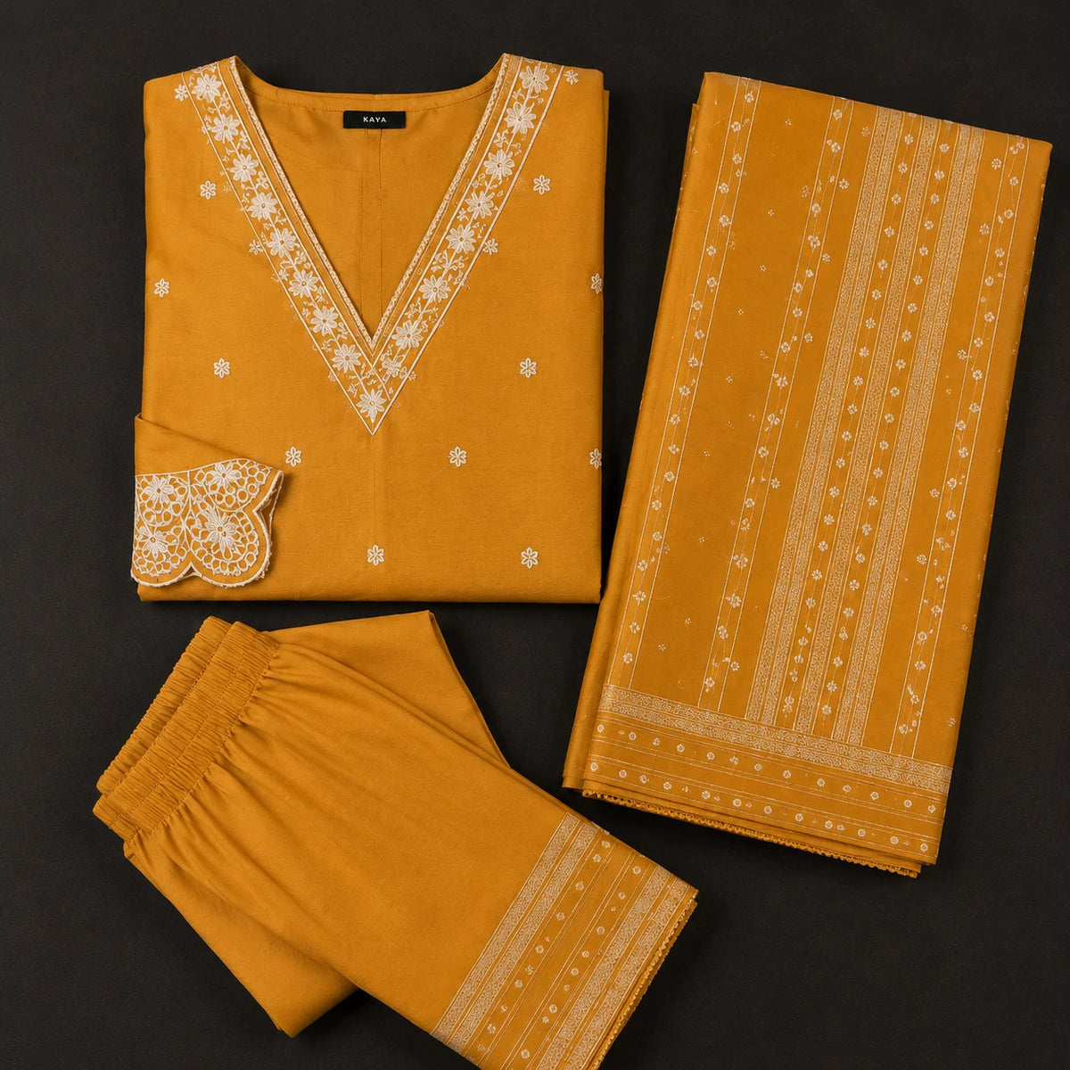 Women's mustard gold embroidered kurta suit set with matching pants and detailed dupatta